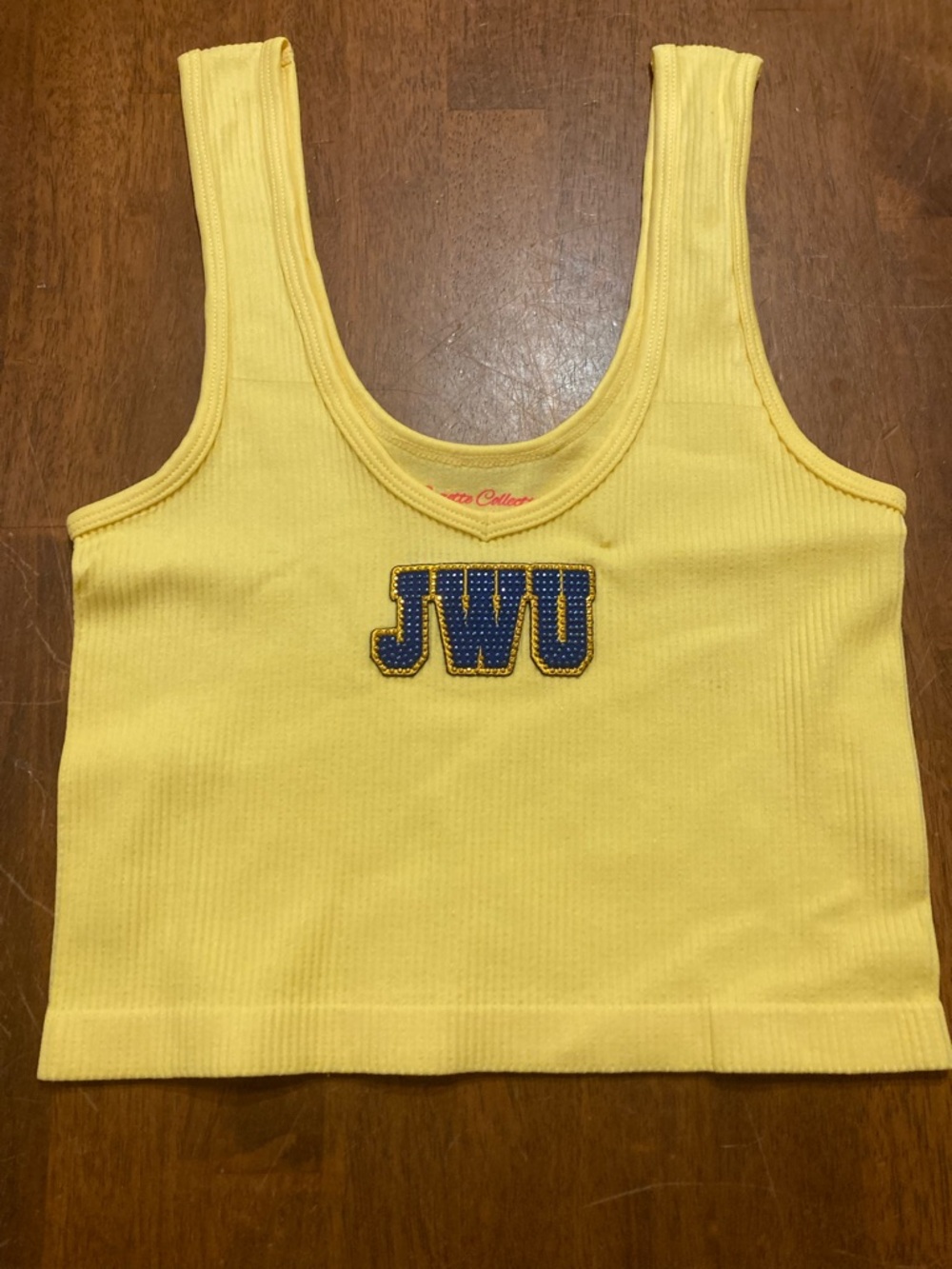 Yellow Ribbed Tank Top with JWU Patch
Johnson and Wales University